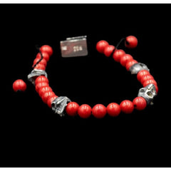 5 SKULLS RED STONE BRACELET